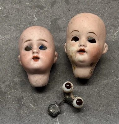 2 cabezas de muñeca alemanas antiguas, 1 juego de cristal y ojo de plomo. Por Heim Steiner, Alemania Foto 1 de 4