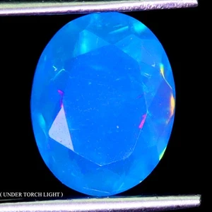 Piedra preciosa rara ovalada natural arco iris azul ópalo de fuego Etiopía limpia de 1,40 quilates 9x7 mm - Imagen 1 de 14