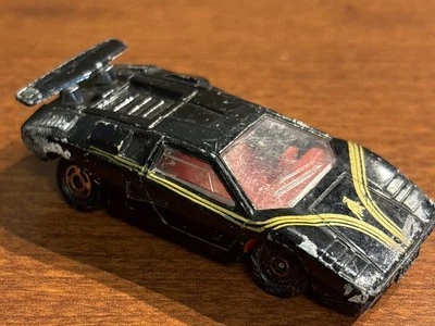 Tomica Lamborghini Countach negro LP500S 1978 muy usado. Jugado con. Hecho en Japón Foto 1 de 4