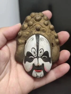 El "脸谱面具模型" de la cerámica del patrimonio cultural antiguo e inmaterial chino Foto 1 de 4