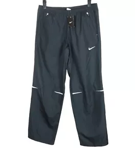 Nuevos pantalones para mujer Nike a prueba de ducha XL UK 16-18 bolsillos con cremallera dobladillos correr - Imagen 1 de 4
