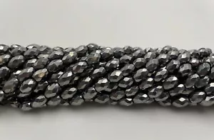 Cuentas facetadas de arroz con forma de terahercio tamaño 5x7 mm hebra 15,5 - Imagen 1 de 3