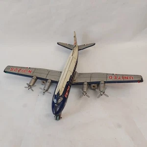Avión de hojalata Vinage Japón United Airlines DC-7 N31225 - Imagen 1 de 24
