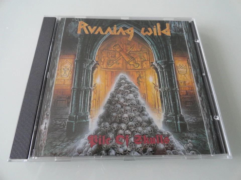 Running Wild "  PILE OF SKULLS" CD 1992 EMI Holland - Bild 1 von 4