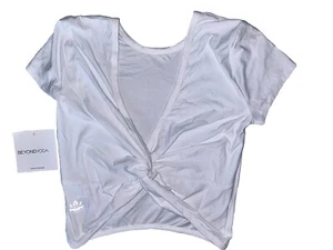 BEYOND YOGA🌸NWT🌸XSMALL🌸CRISSCROSS TEE🌸WHITE🌸KNOT CAN BE WORN FRONT /BACK🌸 - Picture 1 of 11