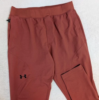Pantalones de chándal Under Armour UA imparables cargo para hombre talla L elásticos marrón/rojo Foto 1 de 4
