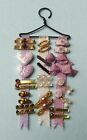 Dolls House Miniatures: display of hairslides (barrettes) by Cheryl Warder