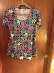 Lularoe top small. Little longer in back. Colorful, will match a lot.  Very soft - Picture 1 of 5