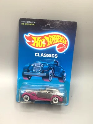 Винтажный Hot Wheels Classic Caddy No1543 Металлическая чешуя Серебро с Розовыми Крыльями как новый на картонке 89' - Изображение 1 из 4