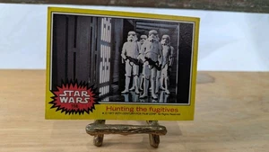 168 Hunting the fugitives | 1977 Topps Star Wars, Series 3 - Picture 1 of 11