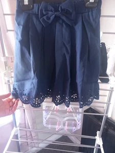 GIRLS NAVY BLUE SUMMER SCHOOL SKIRT AGED 7-8 WITH FRONT BOW - Picture 1 of 3