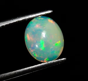 Natural Ethiopian Opal Oval Multi Fire Cabochon Loose Gemstone 10X8X4 mm 2 Ct - Picture 1 of 3