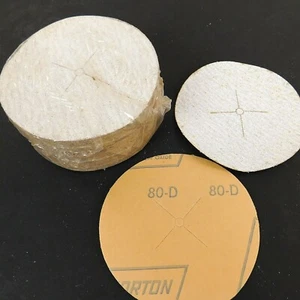 Discos de lijado Norton 4" ranurados x 1/4" grano 80 óxido de aluminio sin relleno, paquete de 75 piezas - Imagen 1 de 4