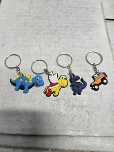 Schlüsselanhänger Konvolut. Dinosaurier, Schildkröte, Offroad Suv. Rucksack Anhänger - Bild 1 von 1