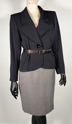 Chaqueta y falda de tweed vintage Yves Saint Laurent Rive Gauche negra con cinturón Foto 1 de 4