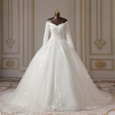 Luxury A-Line Wedding Dress Boat Neck Long Sleeved Lace 3D Applique Bridal Gowns - Image 1 of 4