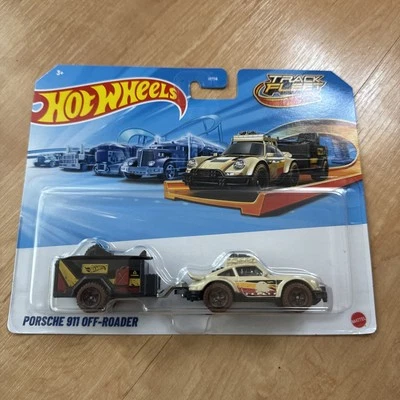 Porsche 911 todoterreno marrón con remolque Hot Wheels flota de orugas 2024 JCM61 Foto 1 de 2