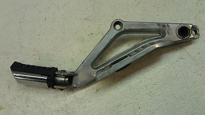 1985 Honda Nighthawk CB650SC CB650 H736' right side passenger foot peg bracket - Image 1 of 4