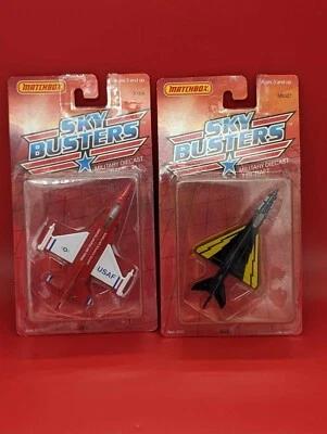 LOTE DE 2 "MATCHBOX" SKYBUSTERS F16A & MIG-21 PLATA y Rojo COMO NUEVO CARDADO Foto 1 de 4
