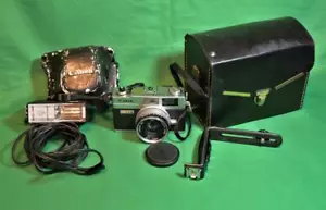 Fotocamera vintage Canonet QL17 GIII telemetro 35 mm con custodia flash nuova batteria - Foto 1 di 7