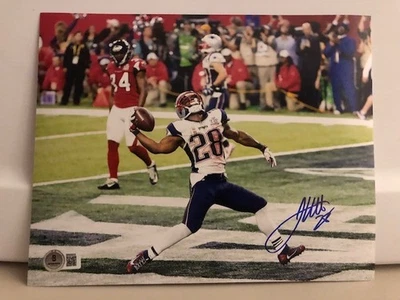 FOTO FIRMADA POR JAMES WHITE AUTOGRAFIADA 8"X10" PATRIOTAS DE NUEVA INGLATERRA con HOLOGRAMA NUEVO Foto 1 de 2
