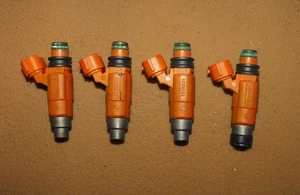 OEM Suzuki 90 HP 4 Stroke Fuel Injector Set (4) PN 15710-65D00 Fits 2001-2007 - Picture 1 of 3