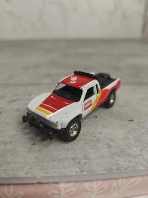 Camión de juguete Maisto Toyota SR5 Baja escala 1/64 diecast vintage Foto 1 de 4