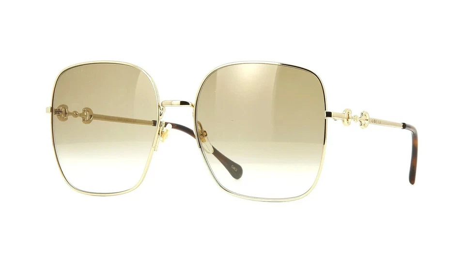 Gucci GG-0879-S 001 Women's Sunglasses - Gold