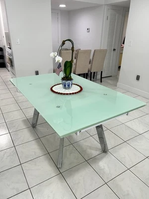 Modern Tempered glass table with frosted finish and angled metal legs. - Image 1 of 2