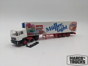 AWM/Herpa MAN F90 Refrigerated semitrailer „Müller Milch“ Conversion 1:87 /AWU26 - Picture 1 of 1