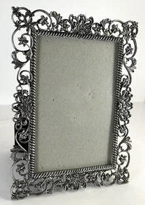 Marco de fotos floral ornamentado de peltre de colección 4"x6" elegante caballete de terciopelo negro trasero - Imagen 1 de 6