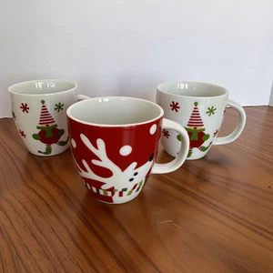 Crate & Barrel 3 Holiday Mini Mugs 7oz, 1 Reindeer with scarf, 2 Jingle Elf cups - Picture 1 of 13