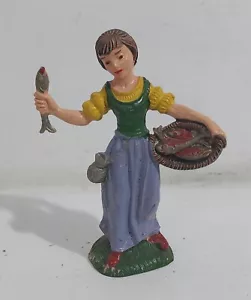 I123892 Pastorello Presepe - statuina in plastica 10/22 - Donna e pesci - 10 cm - Bild 1 von 3