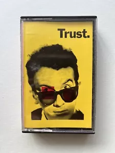 Elvis Costello And The Attractions - Trust Cassette Tape, (1979), Yellow Cover - Picture 1 of 4
