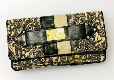 L.A.M.B. Bolso de mano negro y crema con herrajes dorados Glam de Gwen Stefani 2003 Foto 1 de 4