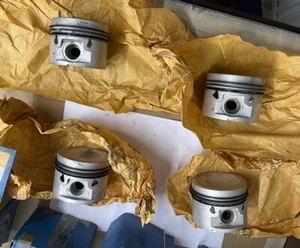 MG 12H 5163 MGB SET OF 4 STANDARD PUSH FIT LOW COMPRESSION PISTONS (GRADE A) - Picture 1 of 5