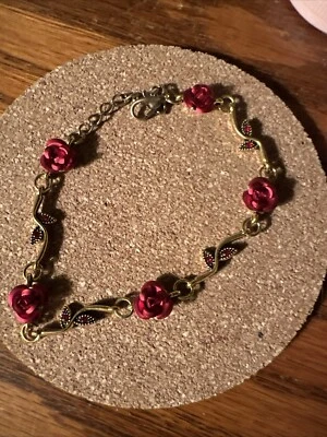 Elegant Gold Bracelet With Red Roses And Red Crystal Accents - Image 1 of 4