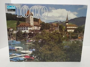 New Hasbro Berner Oberland Switzerland 1000 Piece Puzzle Guild Boats Castle - Picture 1 of 2