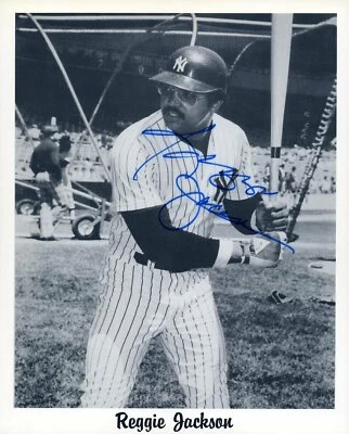 REGGIE JACKSON SIGNED 8x10 PHOTO PSA/DNA NEW YORK YANKEES AUTOGRAPHED WSC MVP - Image 1 of 3