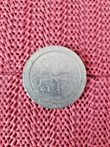 COLLECTIBLE 1979 LAS VEGAS McCARRAN INTERNATIONAL AIRPORT $1 SLOT MACHINE TOKEN - Picture 1 of 2