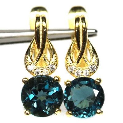 925 Sterling Silver 7 mm. Sky Blue Topaz & Zircon Earrings 18K Gold Plated - Image 1 of 4