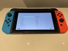 Nintendo Switch 32 GB Console V1 - Neon Blue and Red With Case