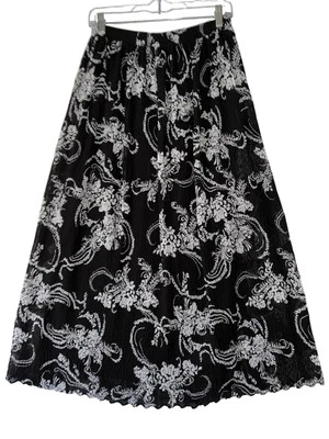 Falda midi plisada floral blanca y negra Christopher & Banks S Foto 1 de 4