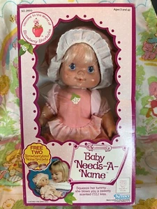 Muñeca de colección Baby Needs-A-Name Blow Kiss 1982 Strawberry Shortcake Kenner SELLADA - Imagen 1 de 7