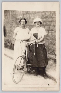 1920s RPPC French Ladies with Bicycle, Street Scene in France Unposted Postcard - Picture 1 of 4