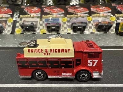 1991 MATCHBOX MACK AUXILIARY POWER TRUCK BRIDGE & HIGHWAY DEPT RED 1/64 Scale - Image 1 of 4