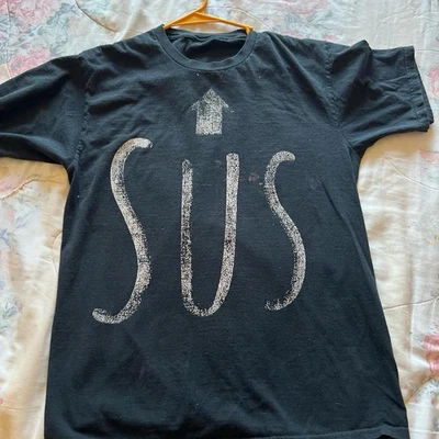 Camiseta Sus Unisex Talla Mediana Manga Corta Negra Estampado Gráfico Foto 1 de 3