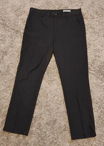 Neu mit Etikett Greg Norman schwarze Performance Herrenhose Größe 34 x 30 - Bild 1 von 2