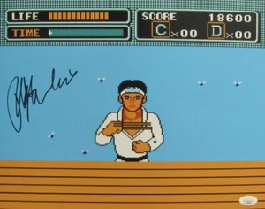 Foto firmada/autografiada por Ralph Macchio 11x14 Nintendo Karate Kid JSA 196824 - Imagen 1 de 3