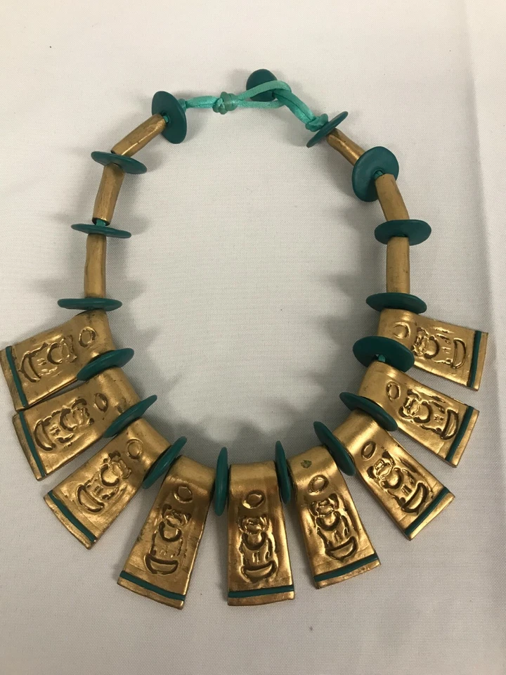 COLAR RARO ANNIE DAY ARTISTA AUSTRALIANO AZUL-PETRÓLEO OURO IMPRESSO BORRACHA PASSARELA - Imagem 1 de 4